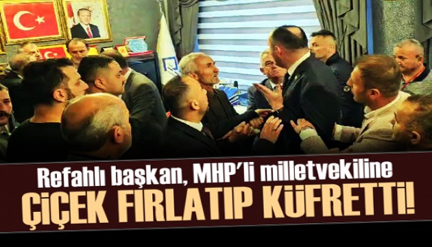 Refahlı başkan, MHP'li milletvekiline çiçek fırlatıp, küfretti!